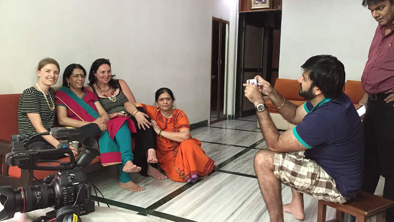 Rajani's nephew Adi takes a behind the scenes family photo with Catherine and Producer Calliste Weitenberg.