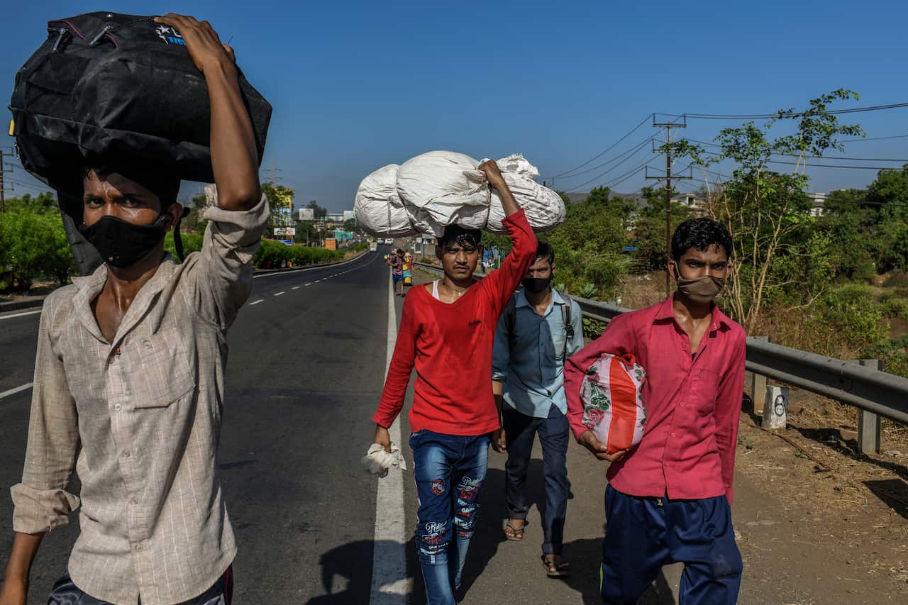 Migrant workers leaving Mumbai, India, for their hometowns, May 7, 2020. 
