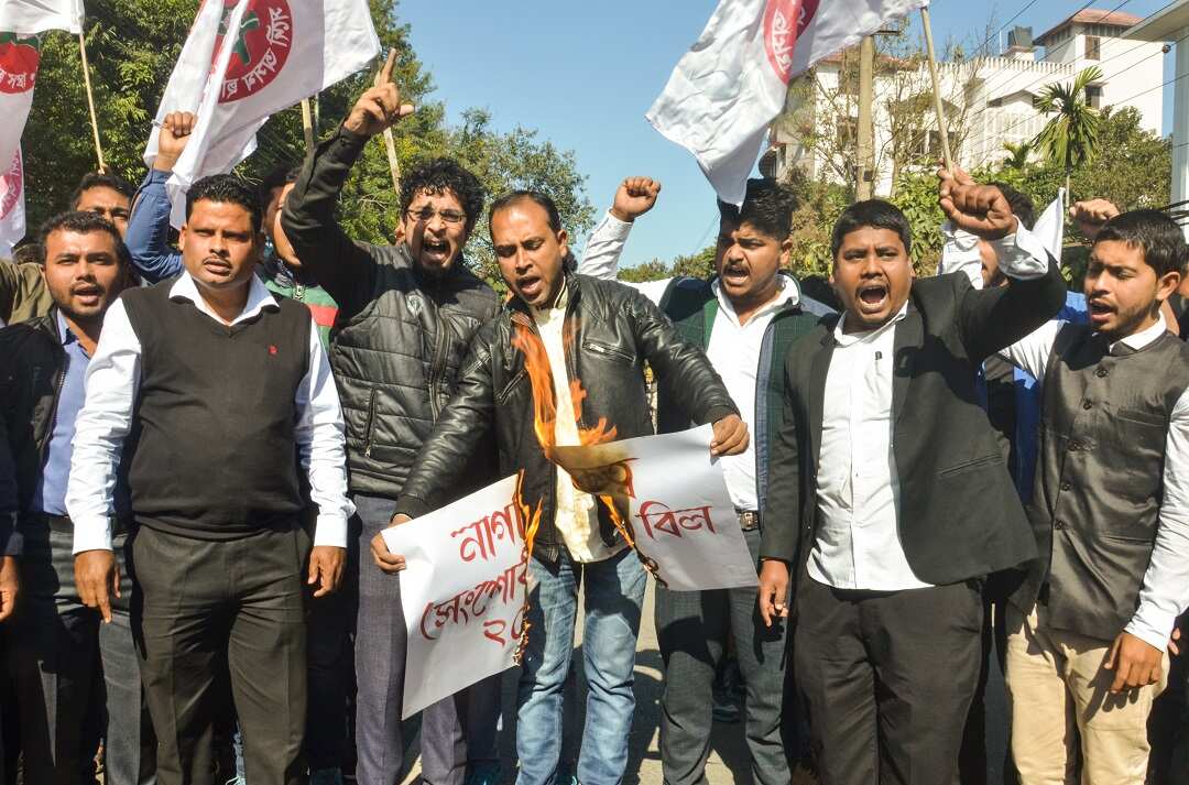 Activists of the All Assam Students' Union (AASU) burn a dummy copy of Citizenship (Amendment) Bill.