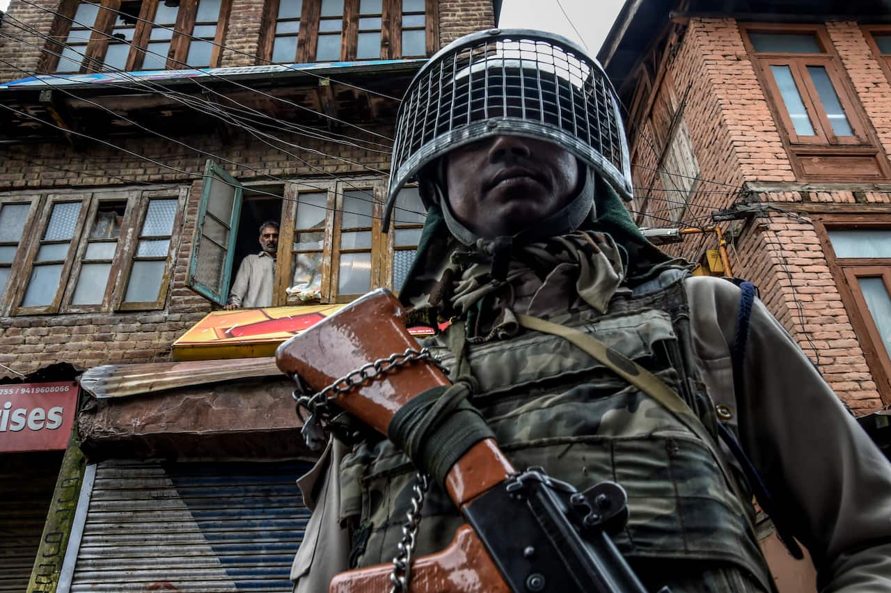 Security forces on the street in Srinagar, India, Aug. 10, 2019. A sense of coiled menace hung over the locked-down city and the wider region on Saturday, a day after a huge protest erupted into clashes between Kashmiris and Indian security forces. (Atul 
