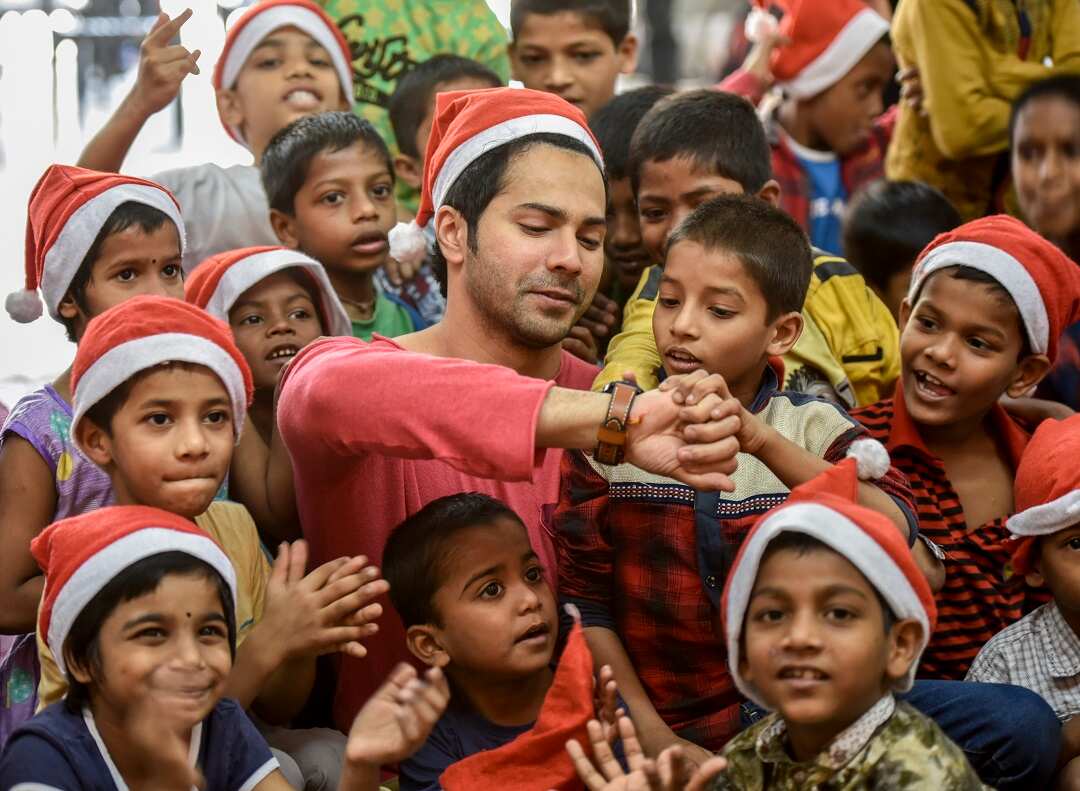 A Bollywood actor Varun Dhawan celebrates pre-Christmas Day with kids at an Indian orphanage.