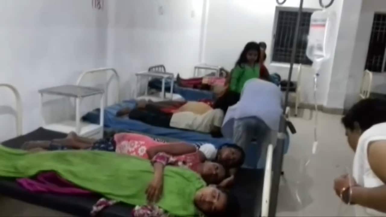 Indian schoolgirls were taken to hospital after they were beaten by boys with sticks.