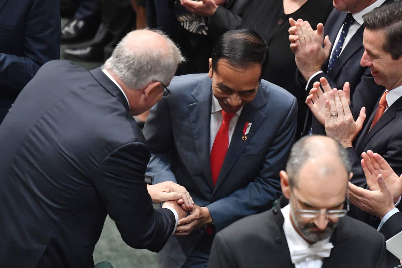 The PM and Mr Widodo shake hands before his address to the House of Representatives.