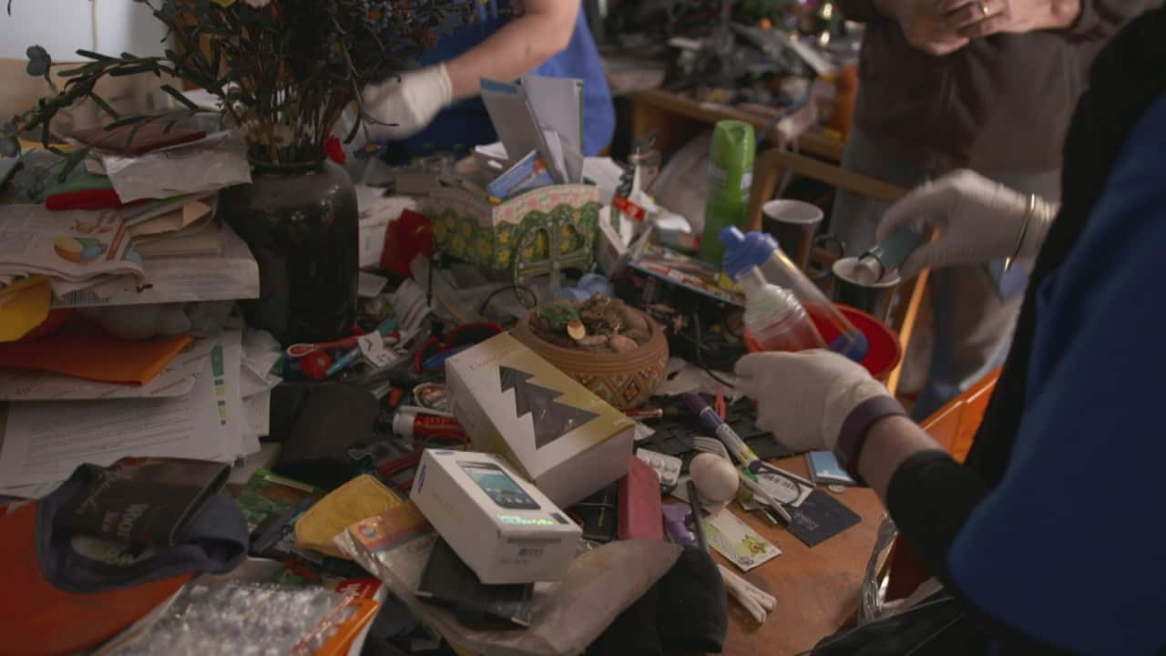 Attempts to help a hoarder clean their home.