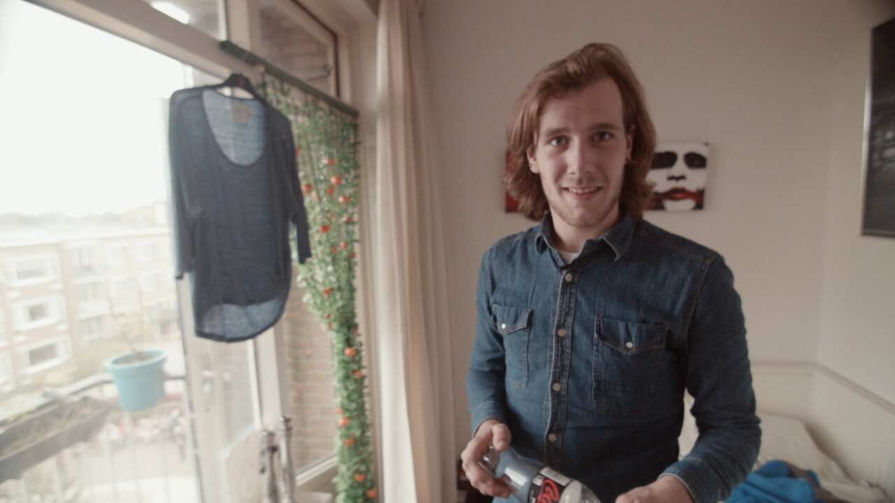 Jordi Pronk in his student room. "They whistle or wink at you or they give you a little slap on the behind," he says of his elderly housemates.