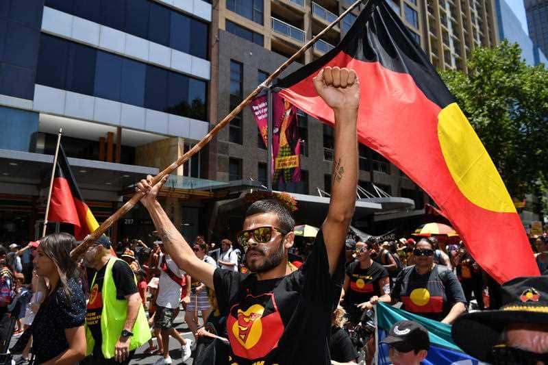 Protesters in Sydney march through Broadway.