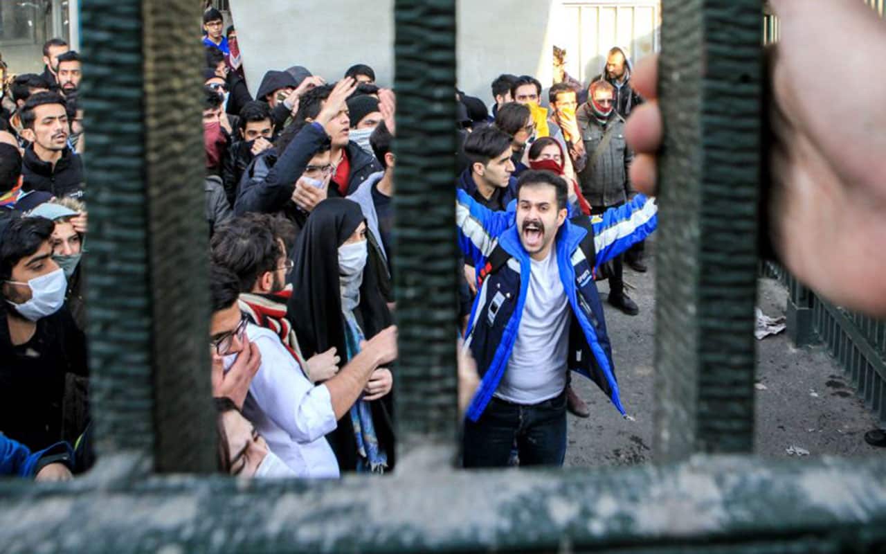People gather to protest over high cost of living in Tehran, Iran on December 30, 2017.