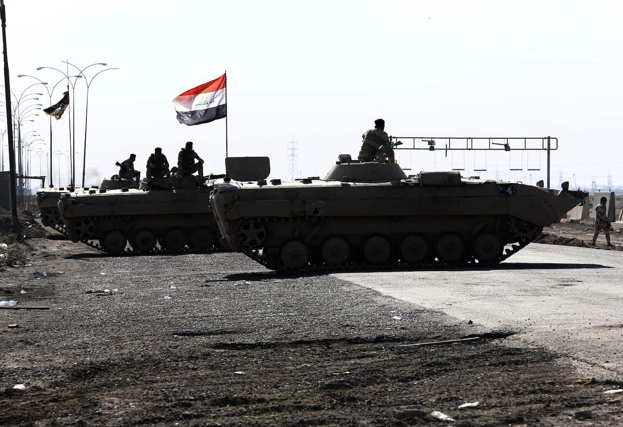 Iraqi Army armored vehicles near the Umm Qasr port. 