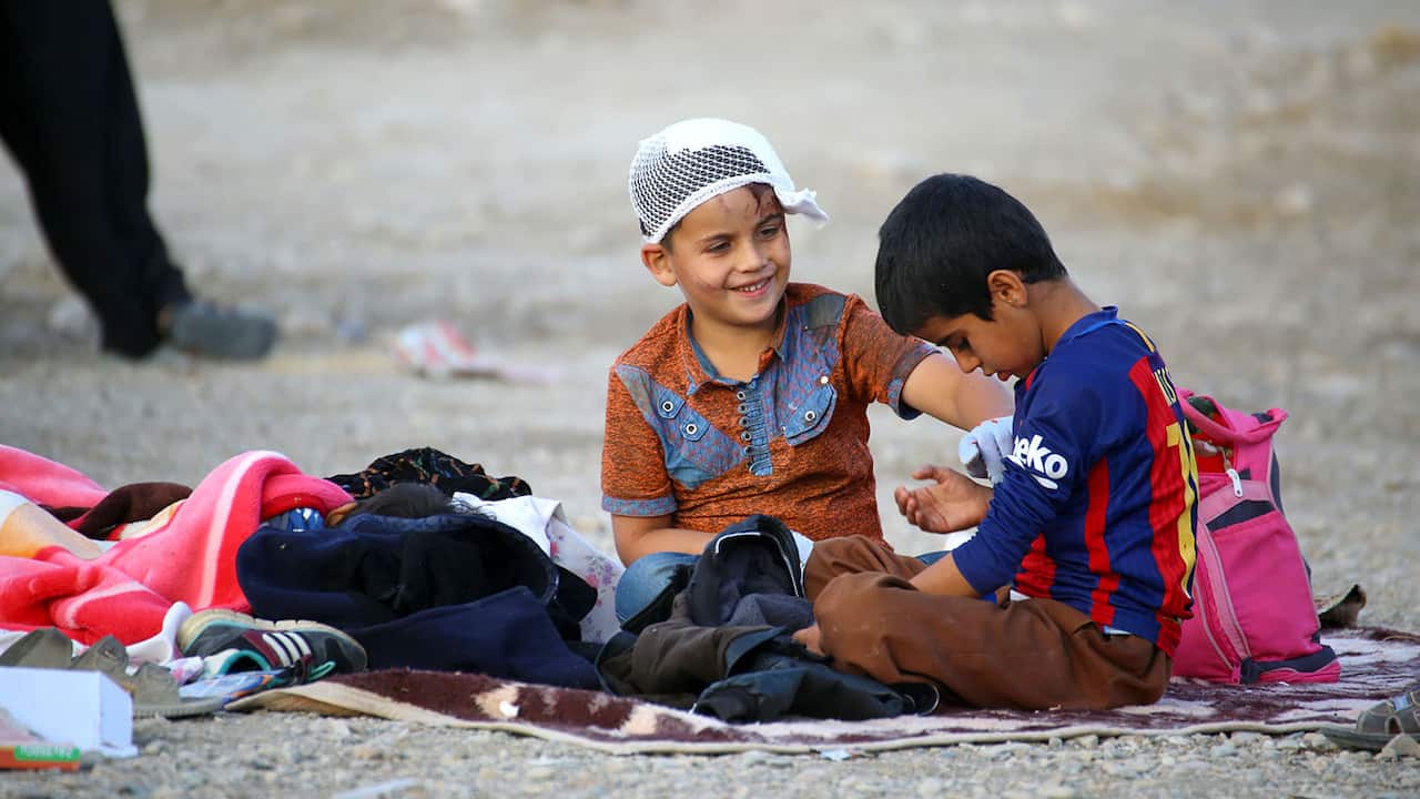 Children camp out in the village of Imam Abbas in the western Iranian province of Kermanshah.