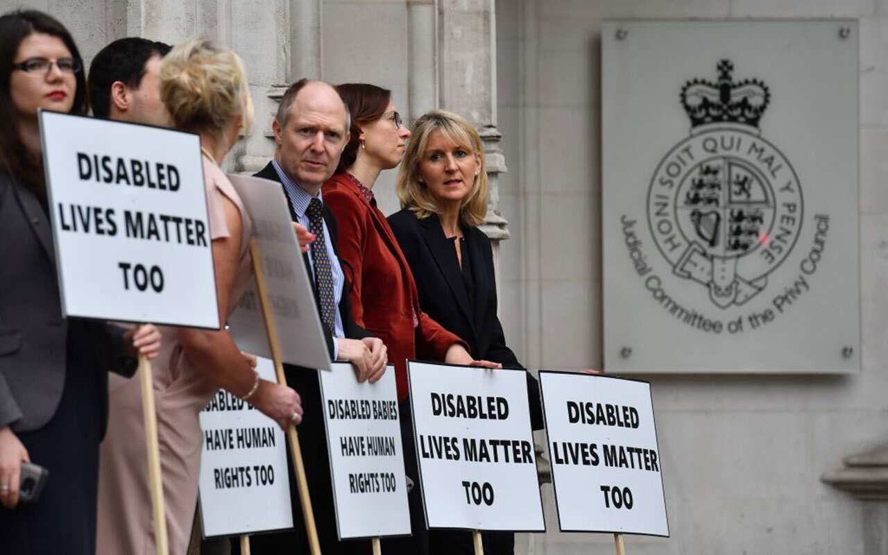 Pro-life demonstrators protest outside the supreme court in London