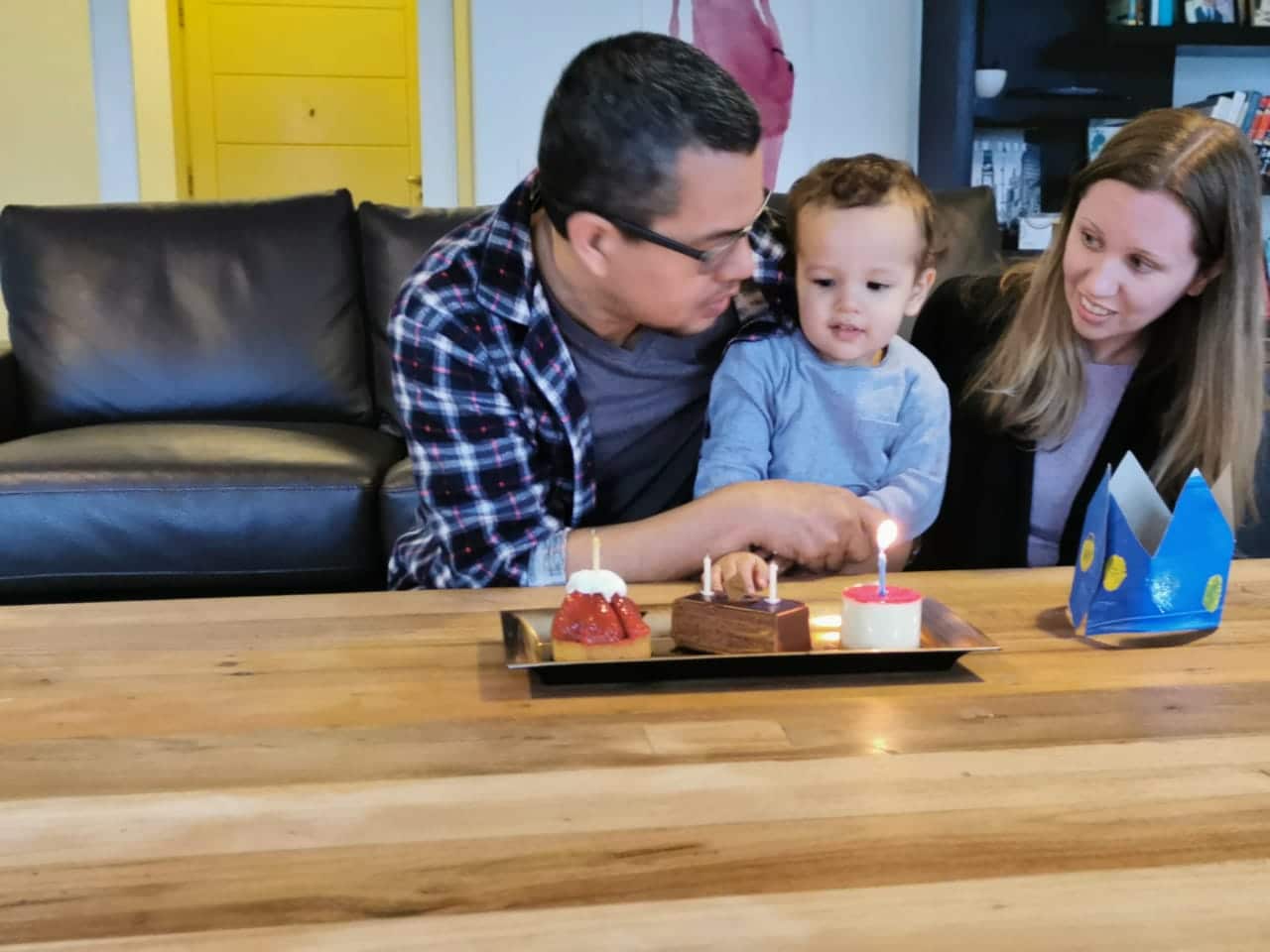 Isaac Oehlers with his parents Craig and Sarah.