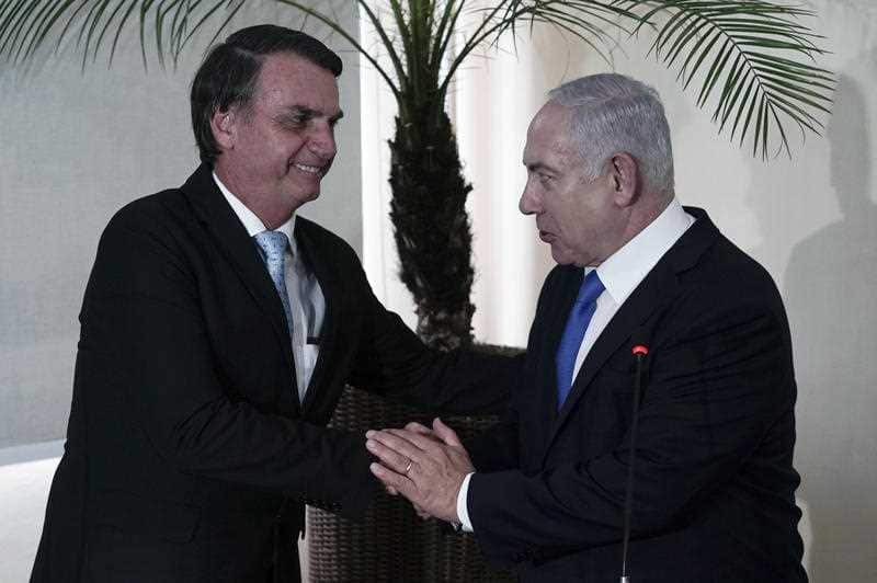 Brazil's President-elect Jair Bolsonaro, left, and Israel's Prime Minister Benjamin Netanyahu. Brazil has already flagged an embassy move.