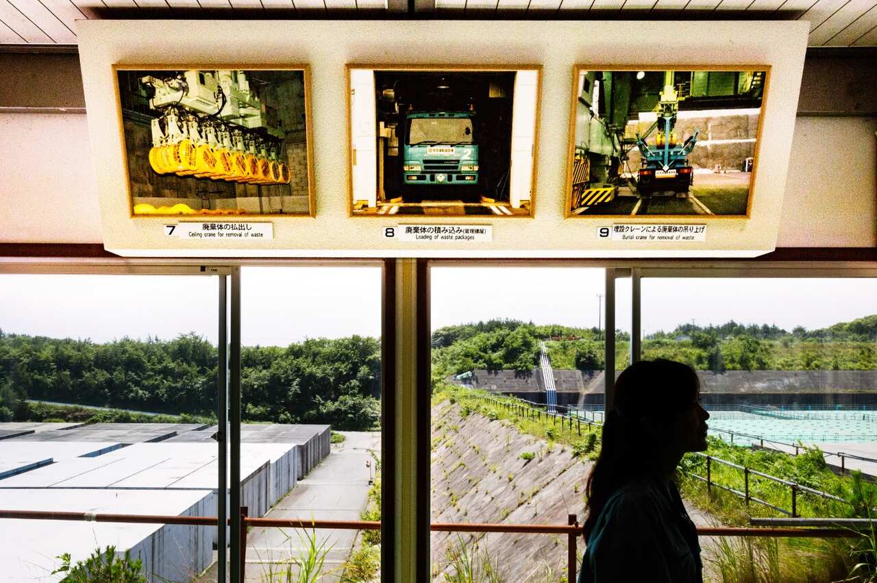 A staff membe­r of Japan Nucle­ar Fuel Ltd. tours the plant site in Rokka­sho, Japan­, Aug. 2, 2018.