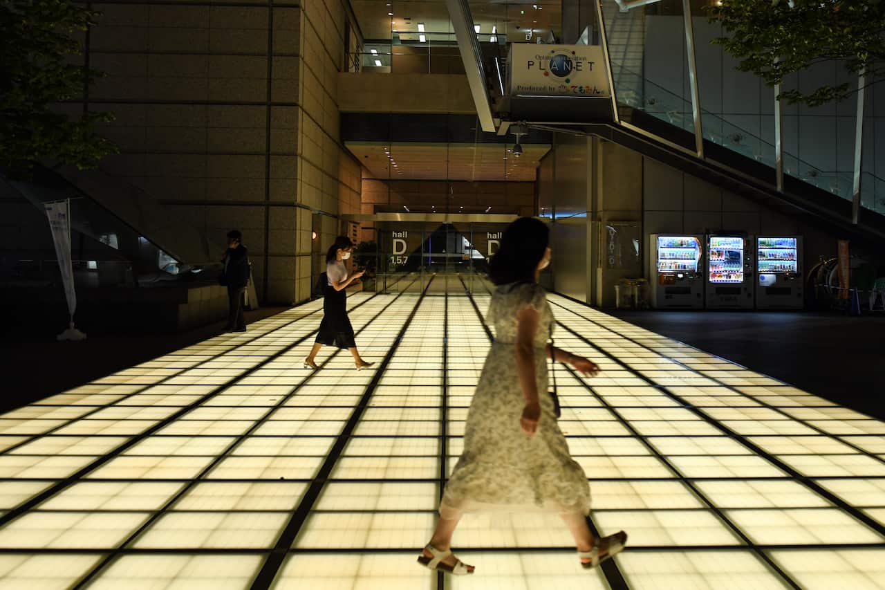 Women walking in Tokyos business district on 8 September, 2020. About one in five women in the city live alone. 