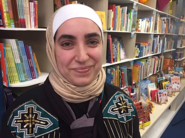 Jasmine Baker tells stories to children in English and Arabic.
