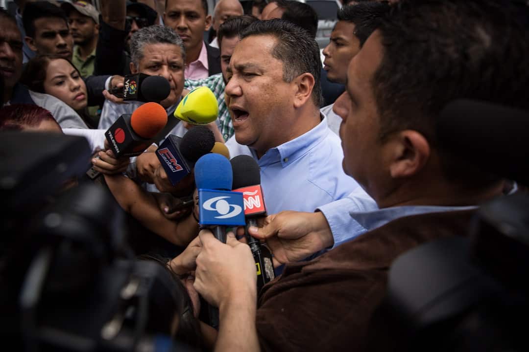 Venezuelan presidential candidate Javier Bertucci, centre.