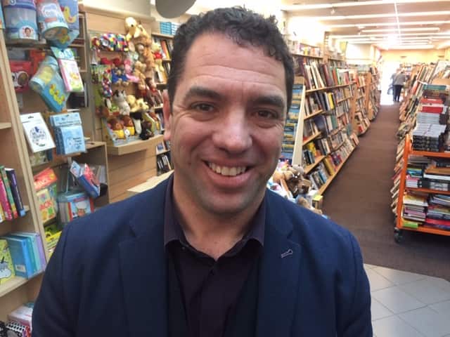 Bookseller Jay Lansdown says more parents are buying hard copy books for their children this year.