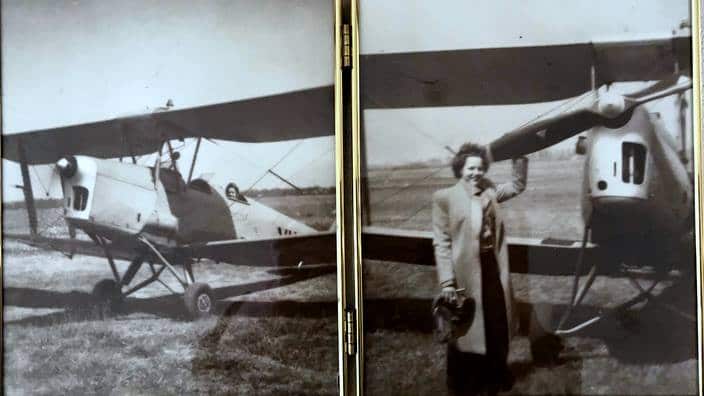 Jean McPhee and Tiger Moth plane