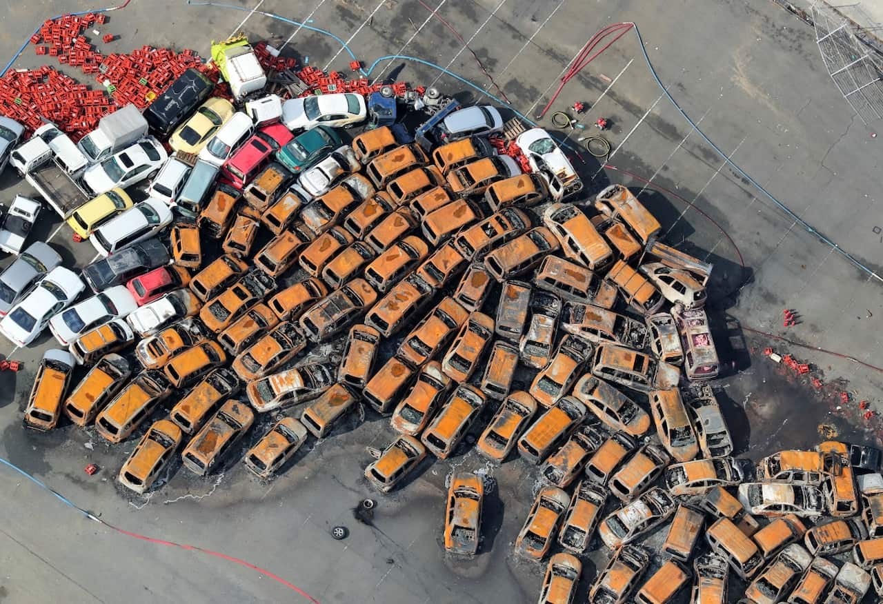 An aerial picture shows burnt cars spread at a yard in Nishinomiya, Hyogo Prefecture, western Japan, 05 September 2018.