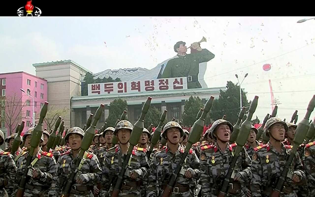In this image made from video broadcast by North Korean broadcaster KRT, soldiers take part in a parade at Kim Il Sung Square in Pyongyang, 