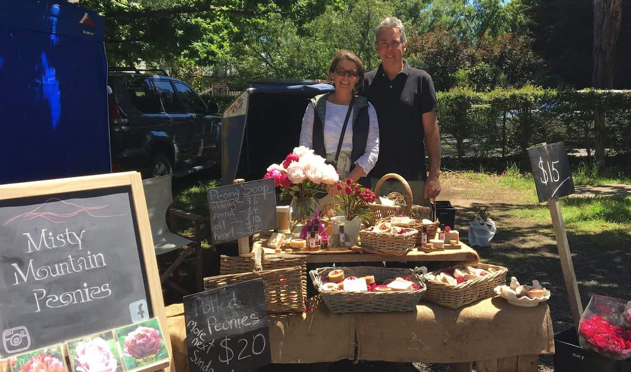 Tasmanian peony farmers Jo and Caleb Wright.