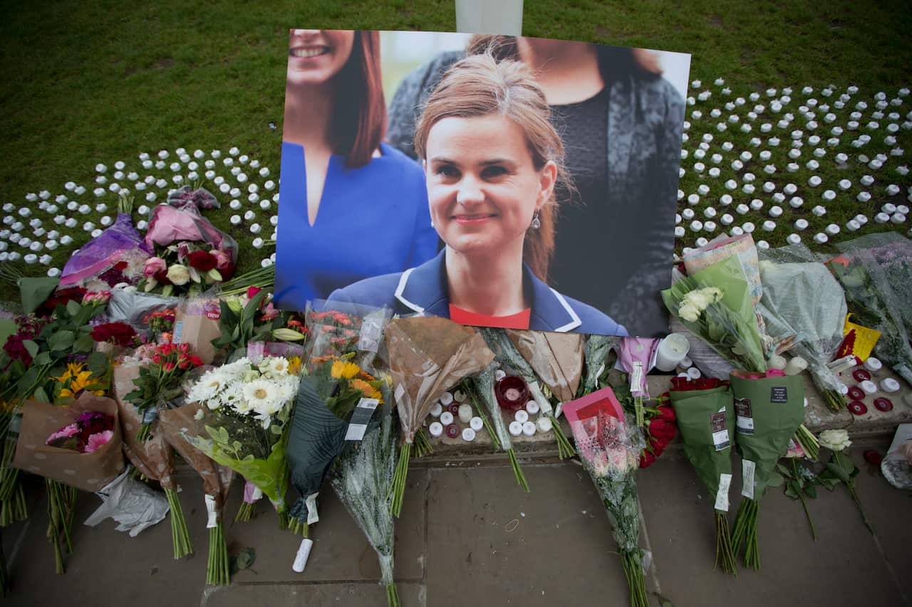 Tributes for Jo Cox, in Parliament Square, outside the House of Parliament in London.