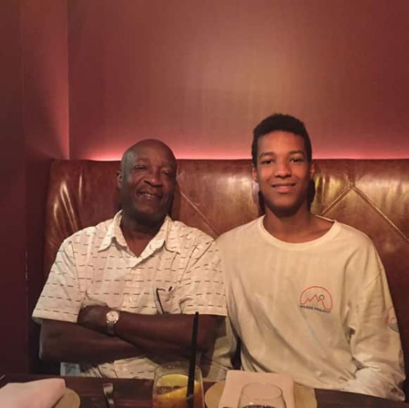 Joel Amartey with his father.