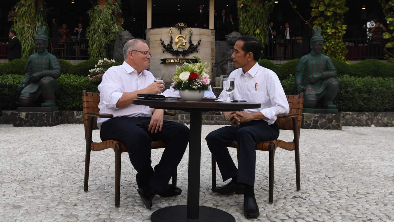 Australian Prime Minister Scott Morrison and Indonesian President Joko Widodo sit down for high tea at the Grand Garden near Bogor Presidential Palace.