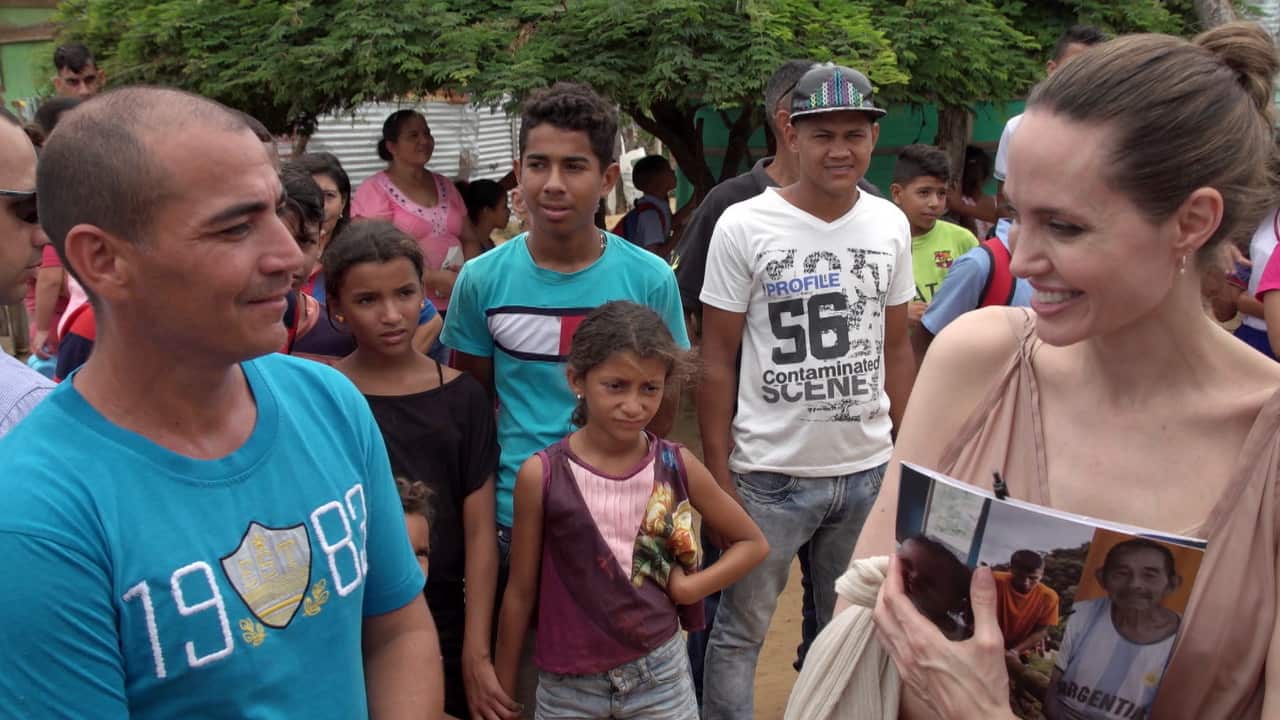 Angelina Jolie speaking with Venezuelan citizens, in La Casa del Abuelo migrant center, in Riohacha, Colombia.