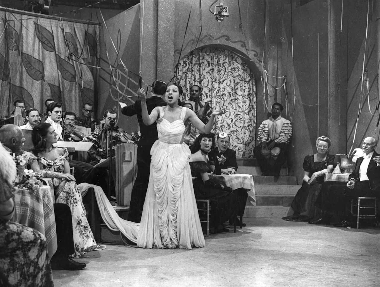 Josephine Baker performs at Alexandra Palace in a BBC cabaret show called Cafe Continental on 26 June 1948.