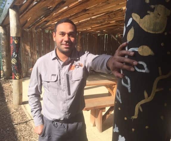 Josh Nicholls hand painted posts in the Australia precinct.