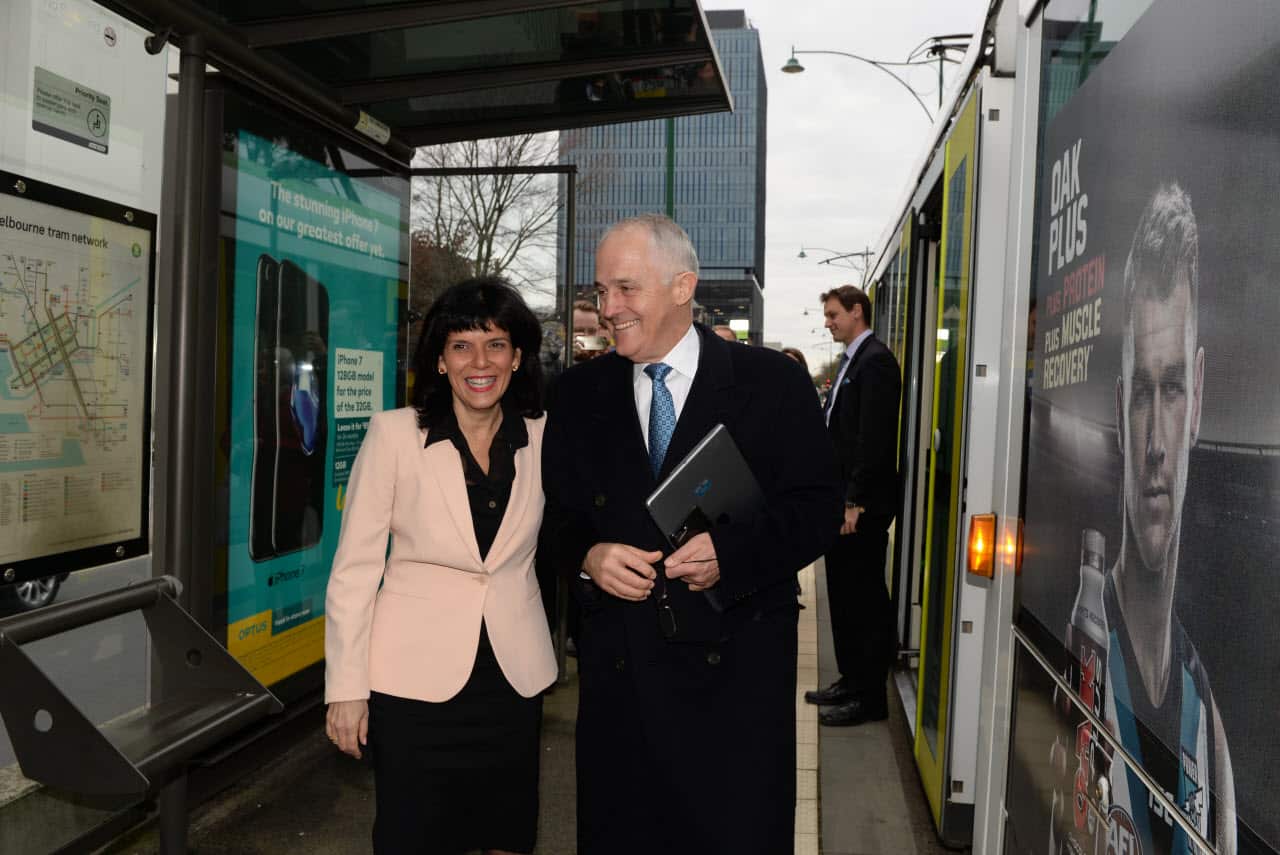 Australian Prime Minister Malcolm Turnbull being meet at a tram stop by Julia Banks 
