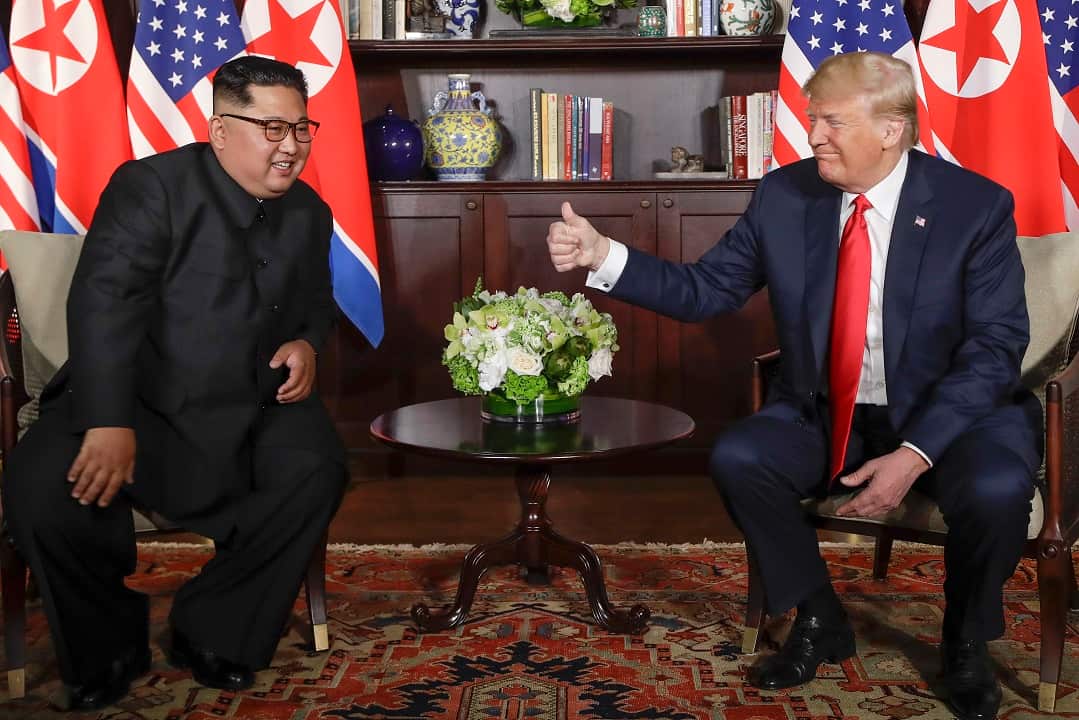 Donald Trump gives the North Korea leader Kim Jong-un a thumbs up at their historic meeting on Sentosa Island.