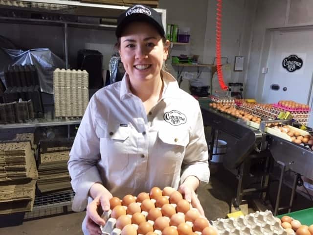 Kate Warner with a tray of eggs sorted and ready for delivery.