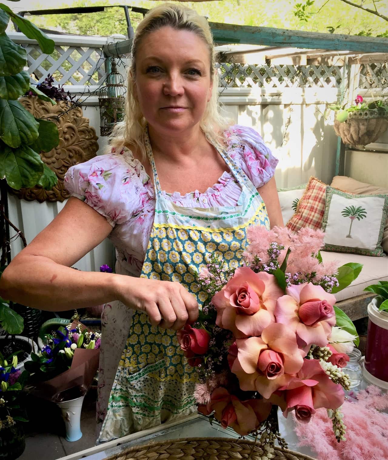 Florist Katie Bloom is supplying fewer weddings this season. 