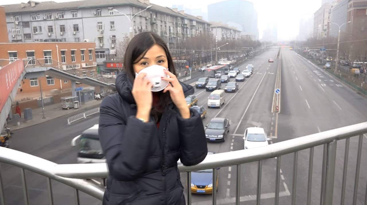 SBS Asia Correspondent Katrina Yu filming a report on smog in Beijing 