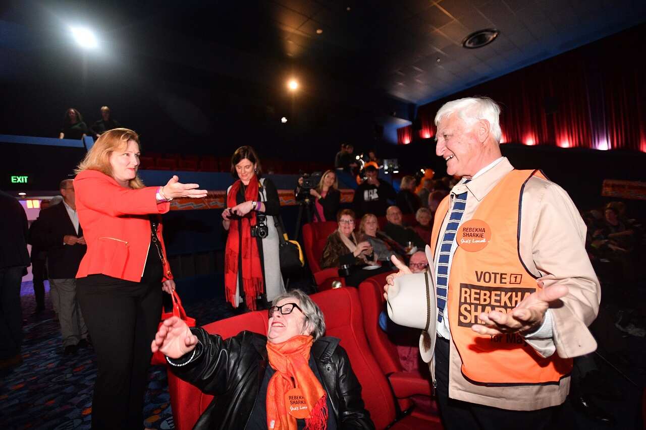 Centre Alliance candidate for Mayo, Rebekha Sharkie (left) reacts alongside Bob Katter MP (right) at the Mt Barker Wallis theatre in Adelaide, South Australia.