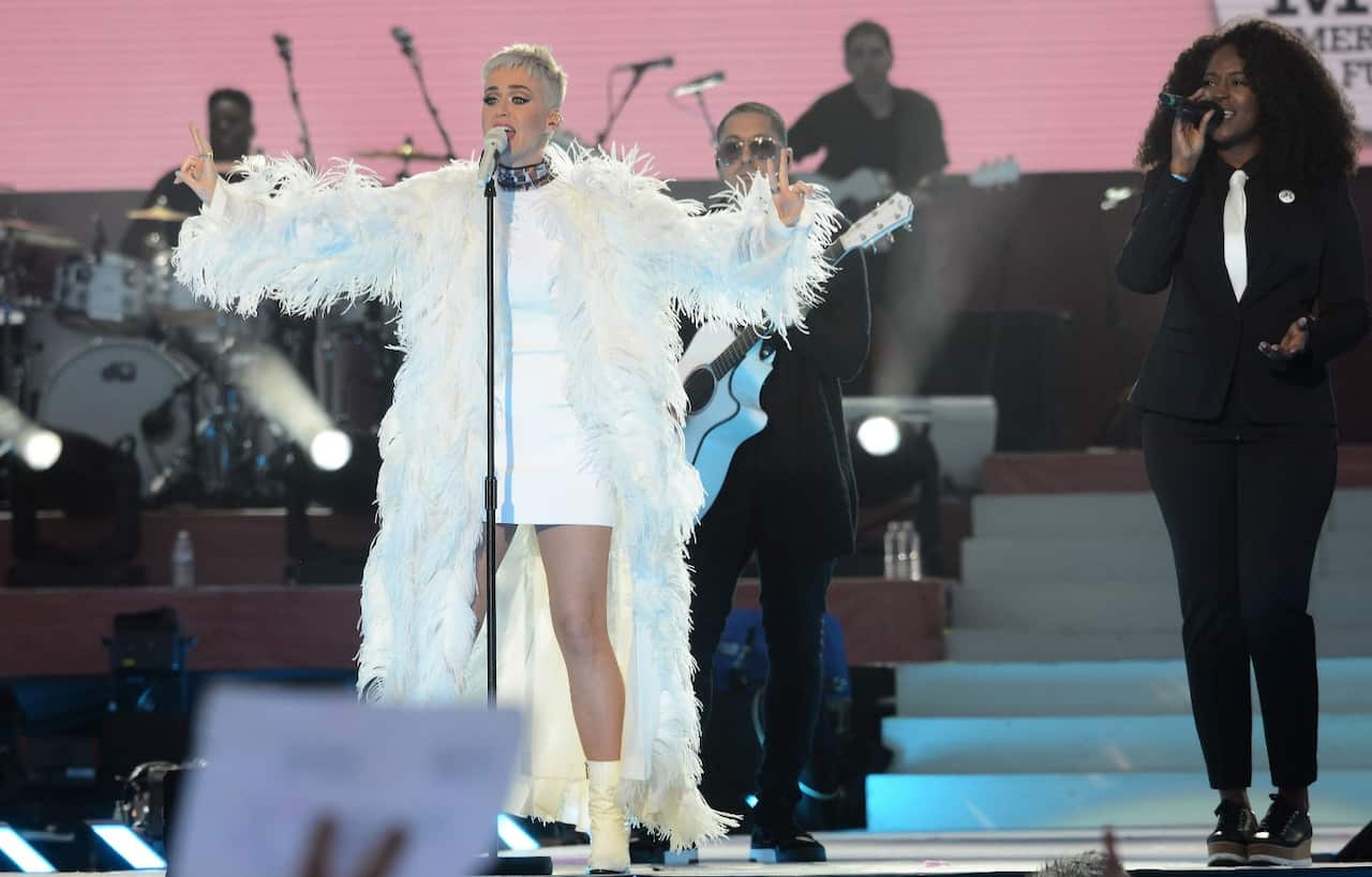 In this Sunday, June 4, 2017, handout photo provided by Dave Hogan for One Love Manchester, singer Katy Perry, left (AAP)