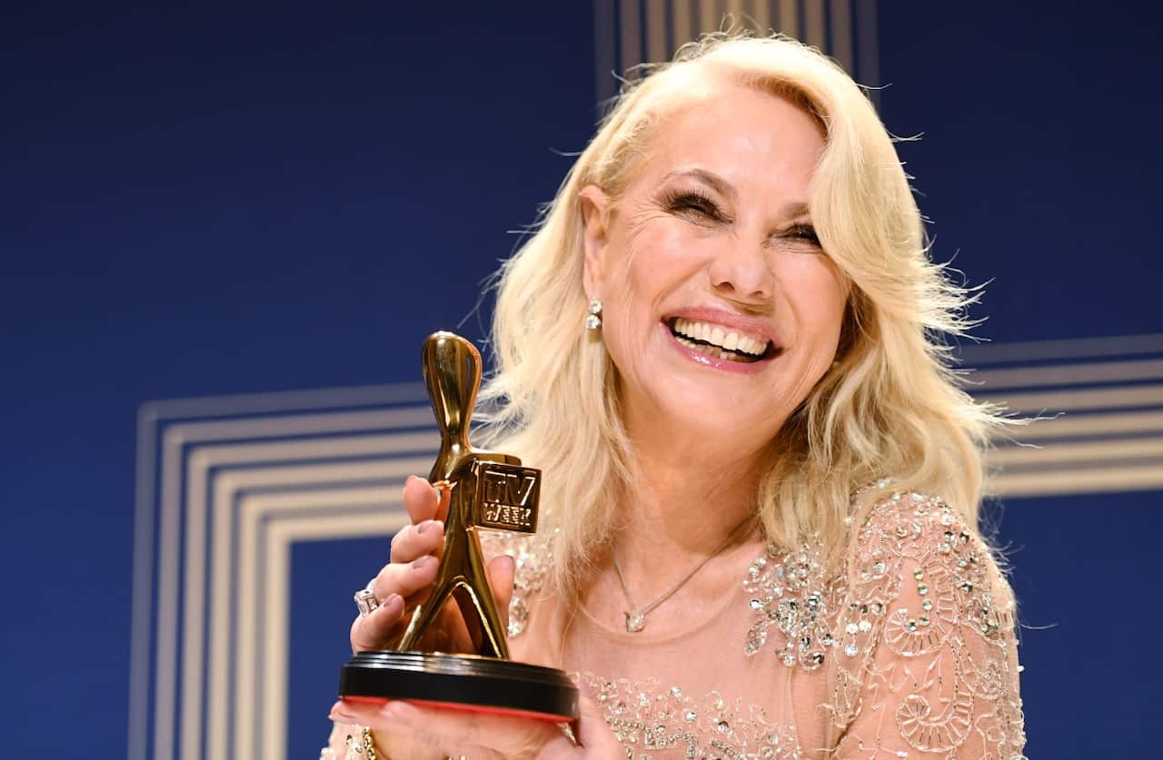 Kerri-Anne Kennerley poses for photographs with her Gold Logie for the TV Week Logie Hall of Fame (AAP)