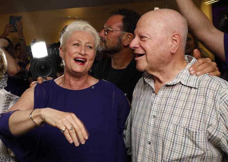 Dr Phelps with a supporter following her win.