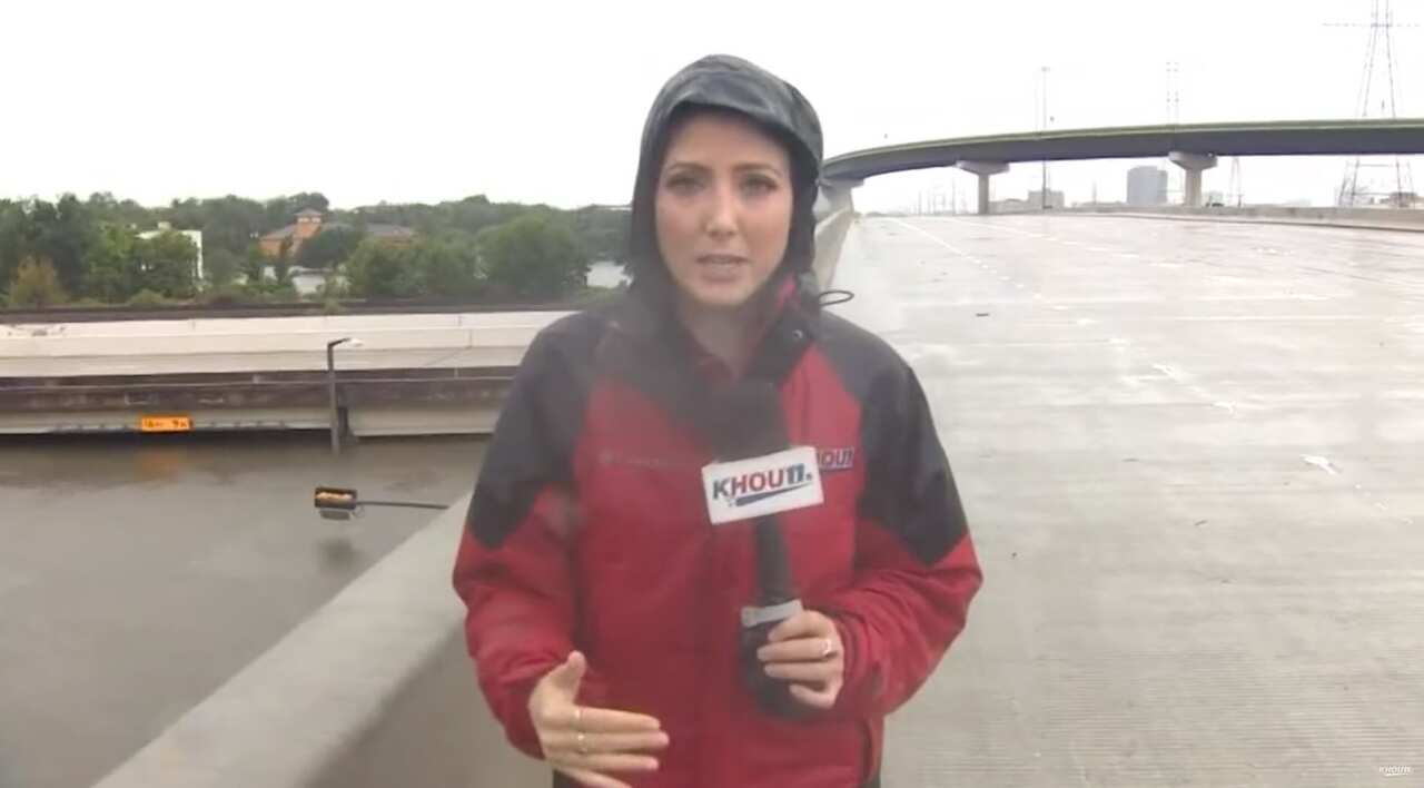 KHOU reporter Brandi Smith and photographer Mario help save a stranded truck driver in north Houston