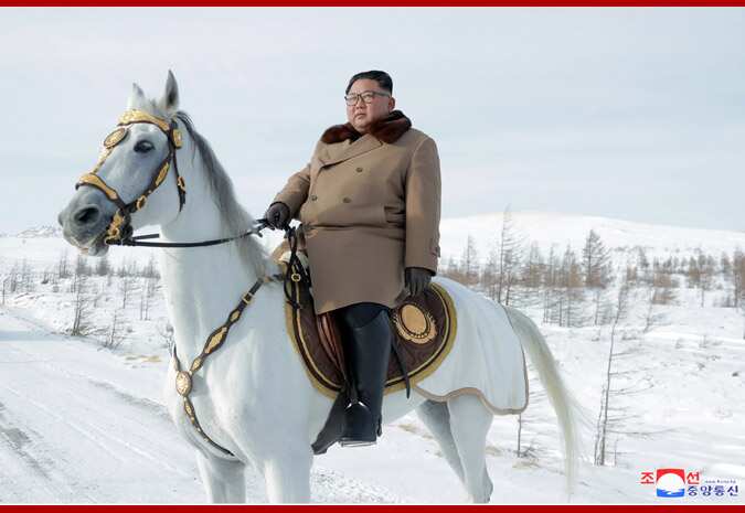 North Korean Supreme Leader Kim Jong Un rides a white horse near Mount Paektu