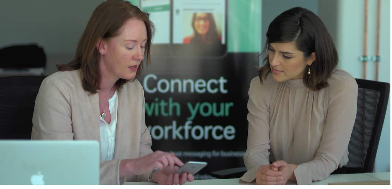 Creator Julia Bray shows journalist Sarah Abo how to use the app.