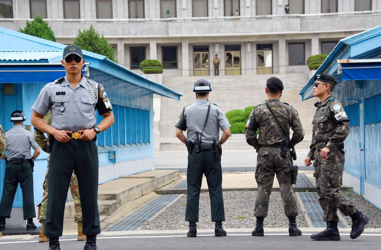 The U.S.-led United Nations Command solders stand guard on Jul. 27, 2017 in front of North Korea's main building