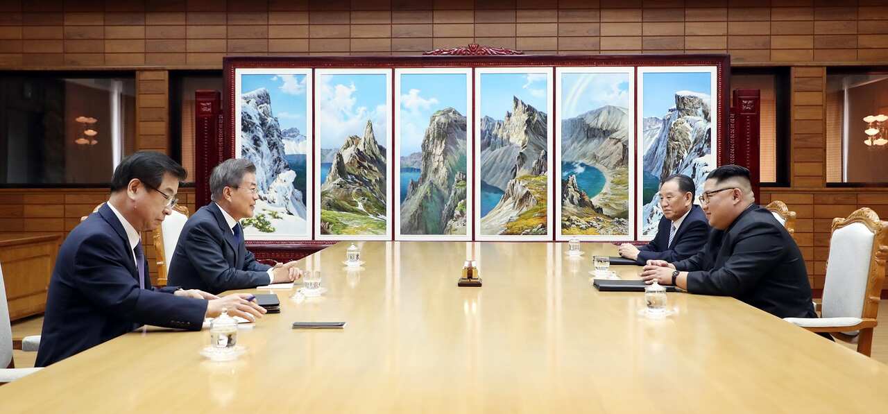The summit took place at Tongilgak on the northern side of Panmunjom in the Demilitarized Zone.