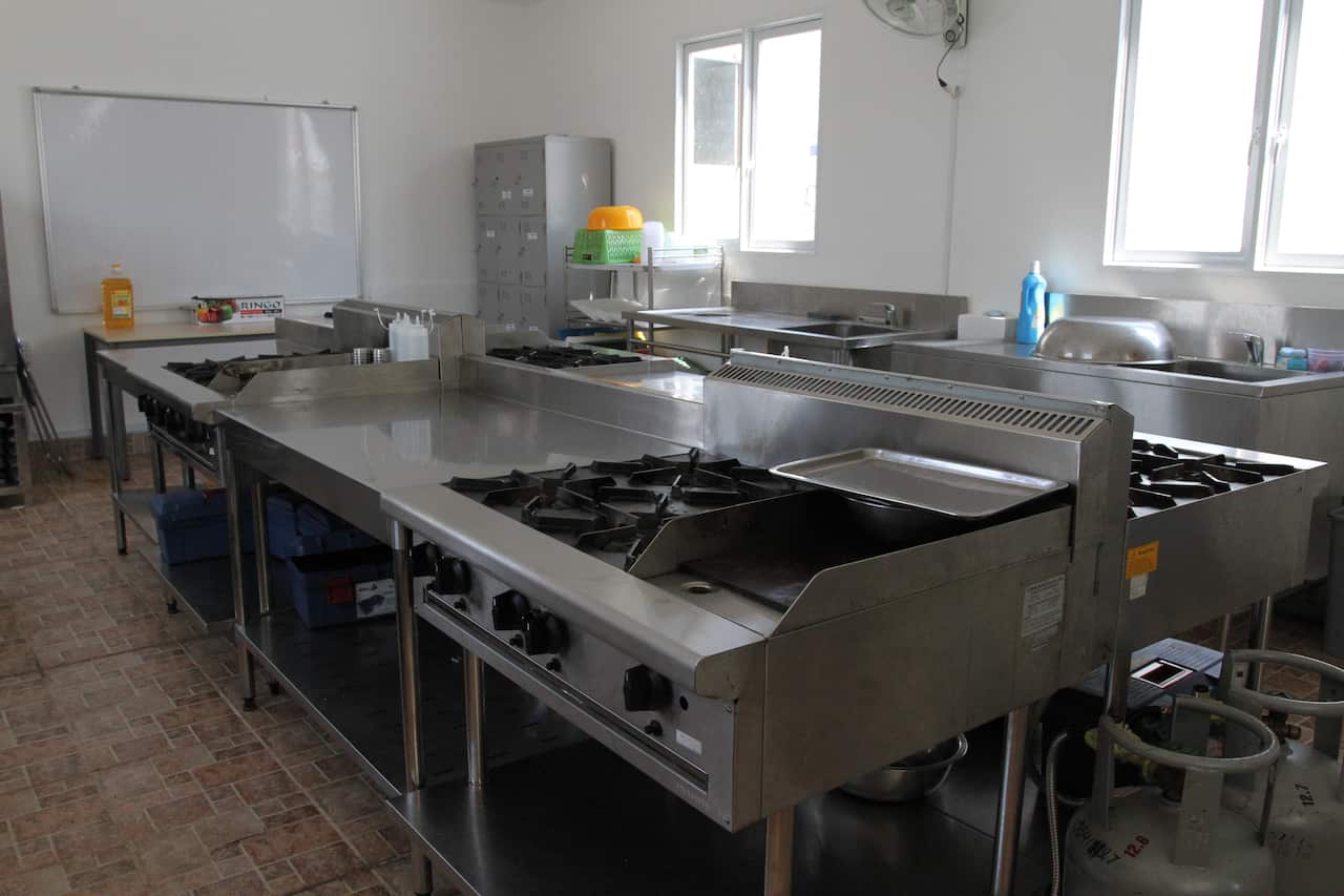 The training kitchen where KOTO students in Ho Minh City, Vietnam learn to cook during their two-year scholarship. (Nathan Taylor/SBS)