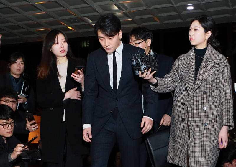 South Korean singer Seungri, a member of K-Pop boy band Big Bang, arrives at the Seoul Police Station.