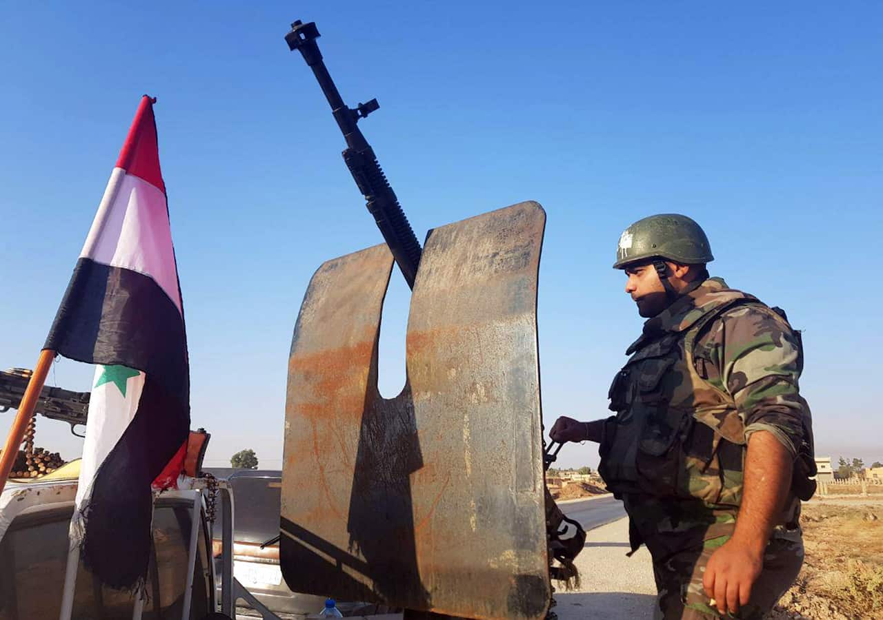 Syrian army soldiers arriving in northwestern Syria as tensions escalate with Turkey.