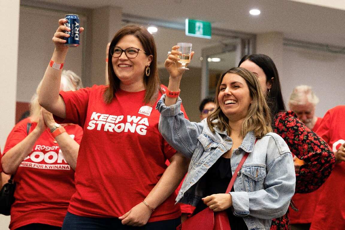 Labor supporters celebrate at the Gary Holland Community Centre in Rockingham. 