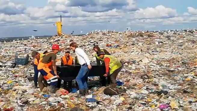 The grand piano is positioned for the performance.